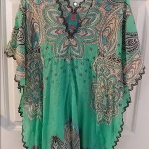 Johnny Was blouse. Very pretty print and color. In good shape. Originally $125